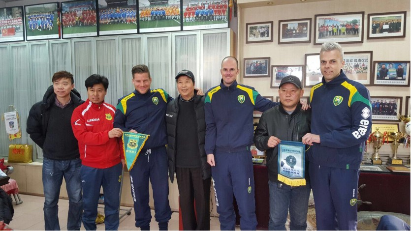 ADO trainers in China, via ADO Den Haag. 